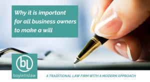 Woman's hand signing a document image for why business owners should make a will blog